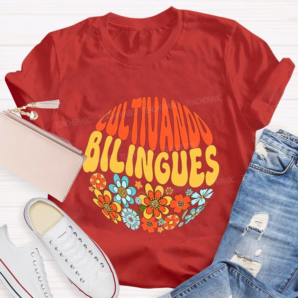 Cultivando Bilingues And Colorful Flowers Teacher T-shirt
