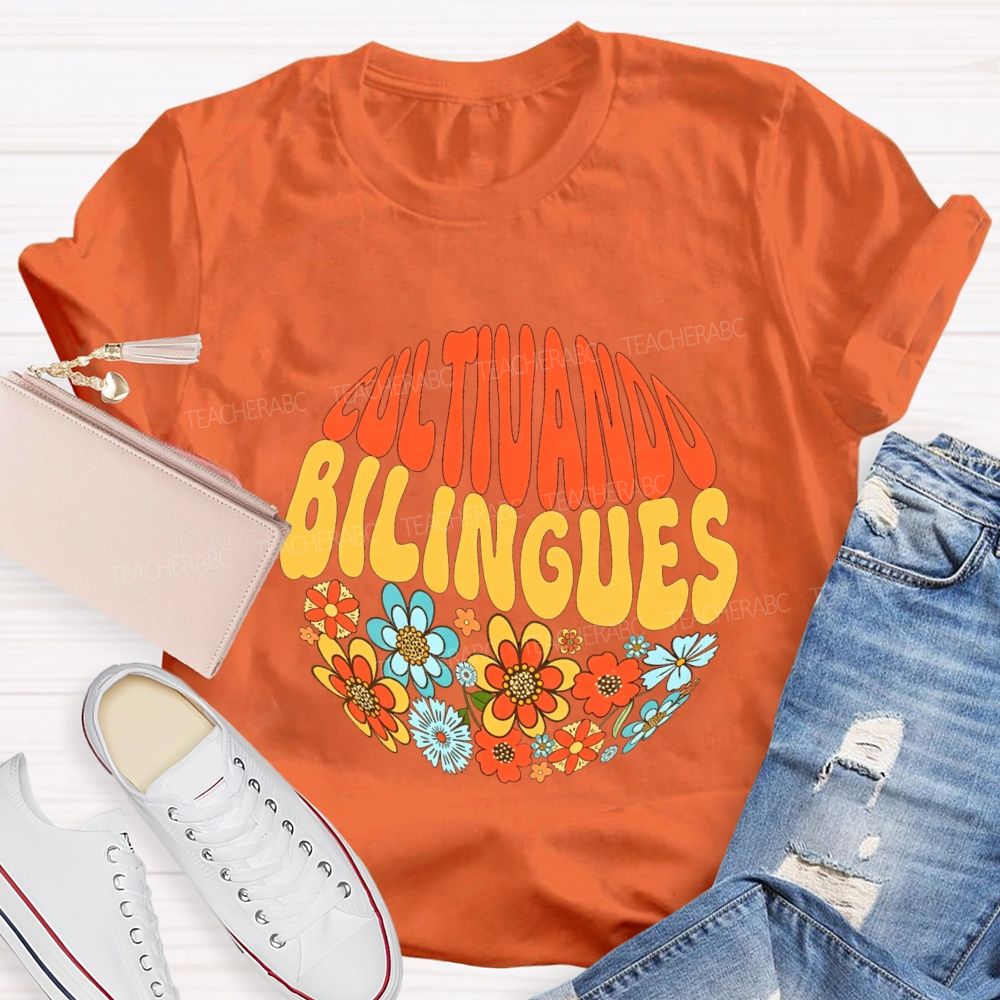 Cultivando Bilingues And Colorful Flowers Teacher T-shirt