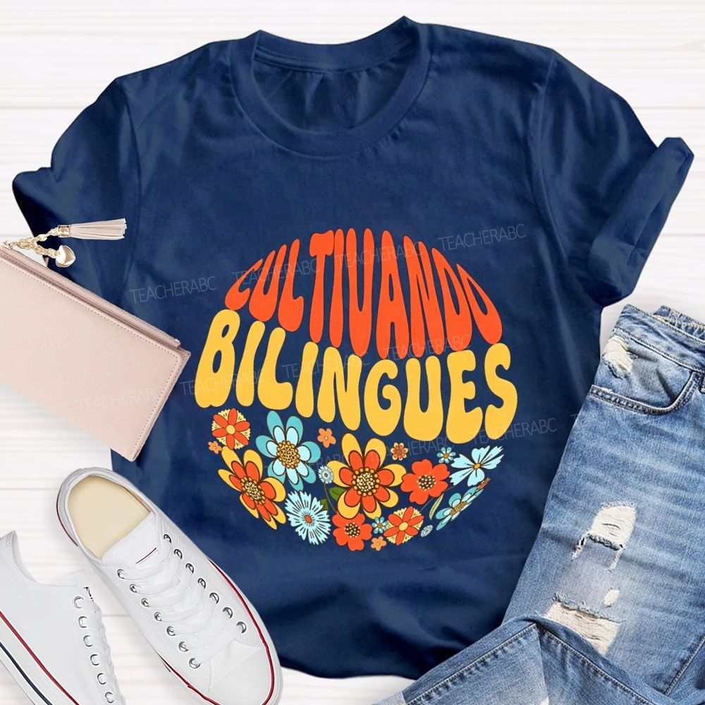Cultivando Bilingues And Colorful Flowers Teacher T-shirt