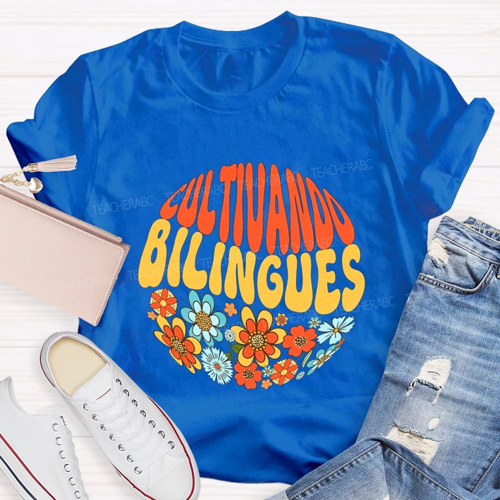 Cultivando Bilingues And Colorful Flowers Teacher T-shirt