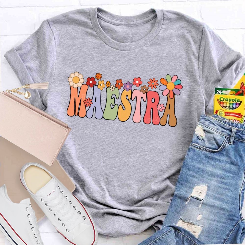 Maestra Colorful Fonts And Small Flowers Teacher T-shirt