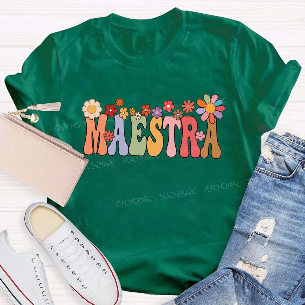 Maestra Colorful Fonts And Small Flowers Teacher T-shirt