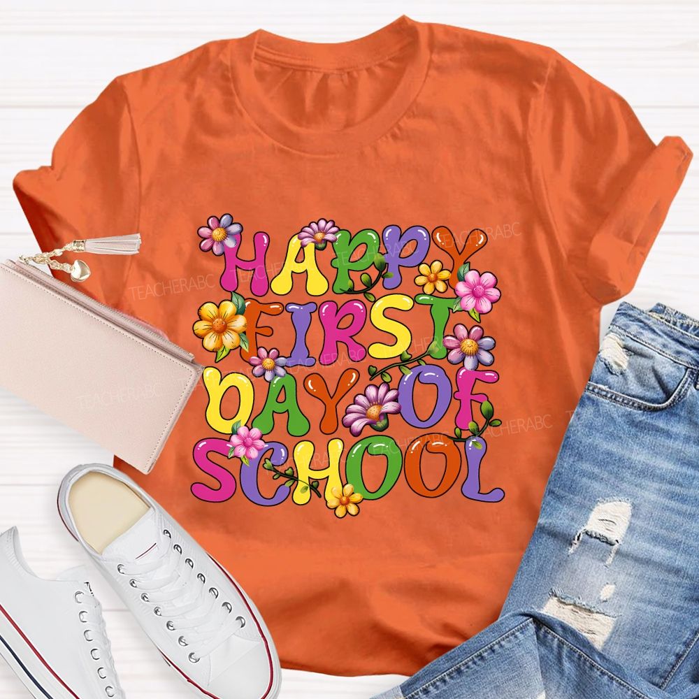 Happy First Day Of School Colorful Fonts And Flowers Teacher T-shirt