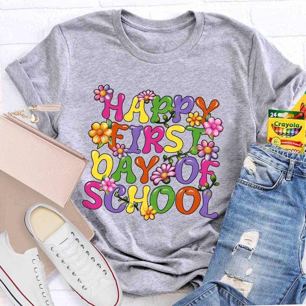 Happy First Day Of School Colorful Fonts And Flowers Teacher T-shirt