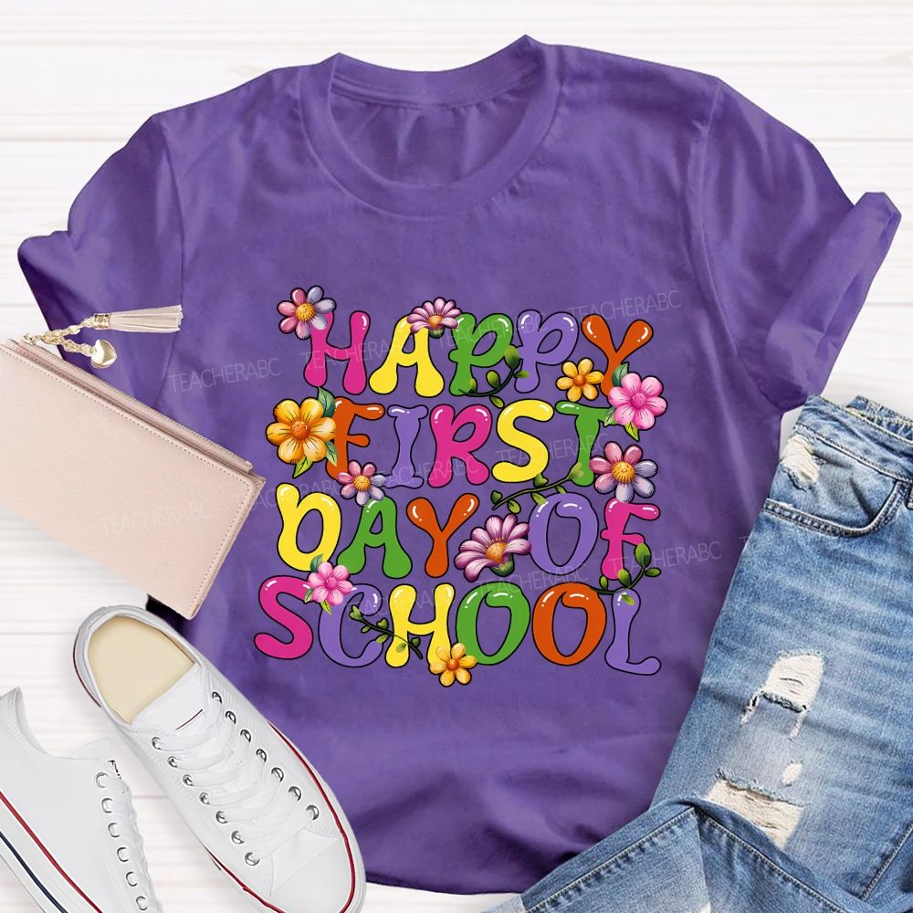 Happy First Day Of School Colorful Fonts And Flowers Teacher T-shirt