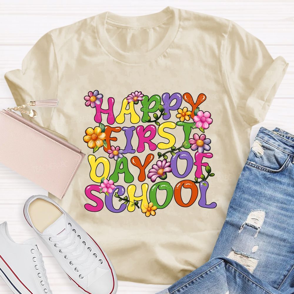 Happy First Day Of School Colorful Fonts And Flowers Teacher T-shirt