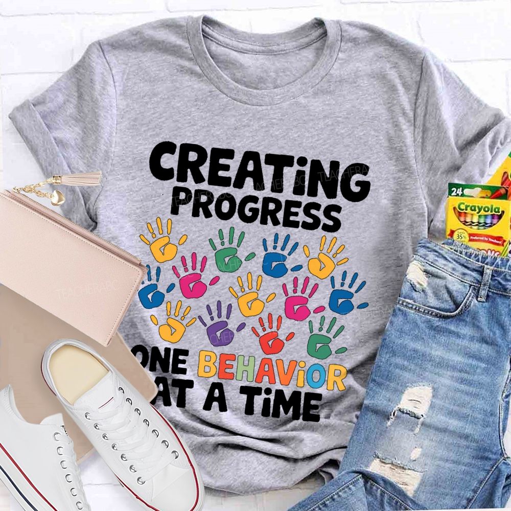 Creating Progress One Behavior At A Time  Teacher T-shirt