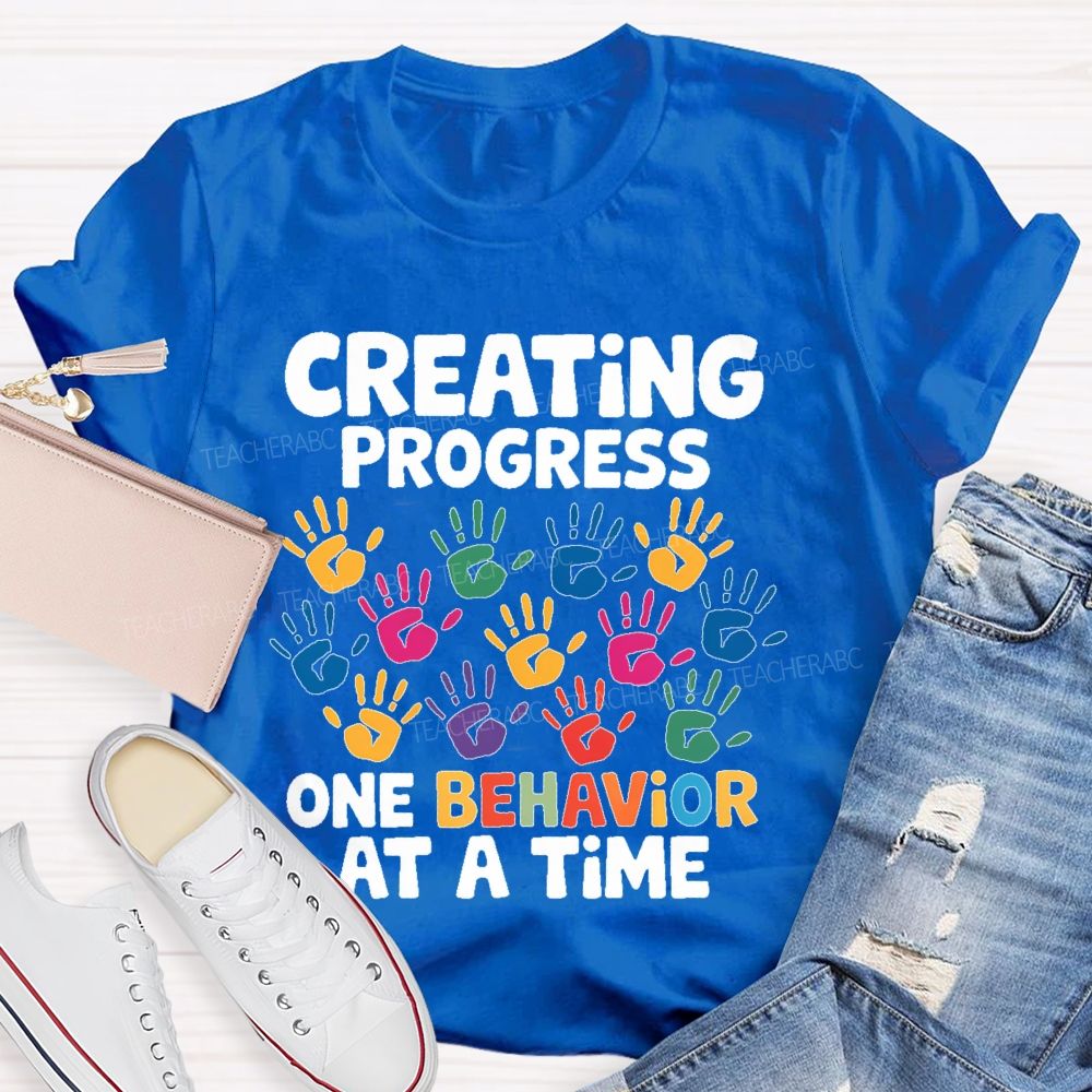 Creating Progress One Behavior At A Time  Teacher T-shirt