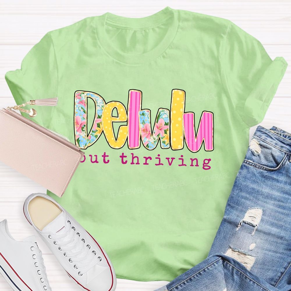 Delulu But Thriving Teacher T-shirt