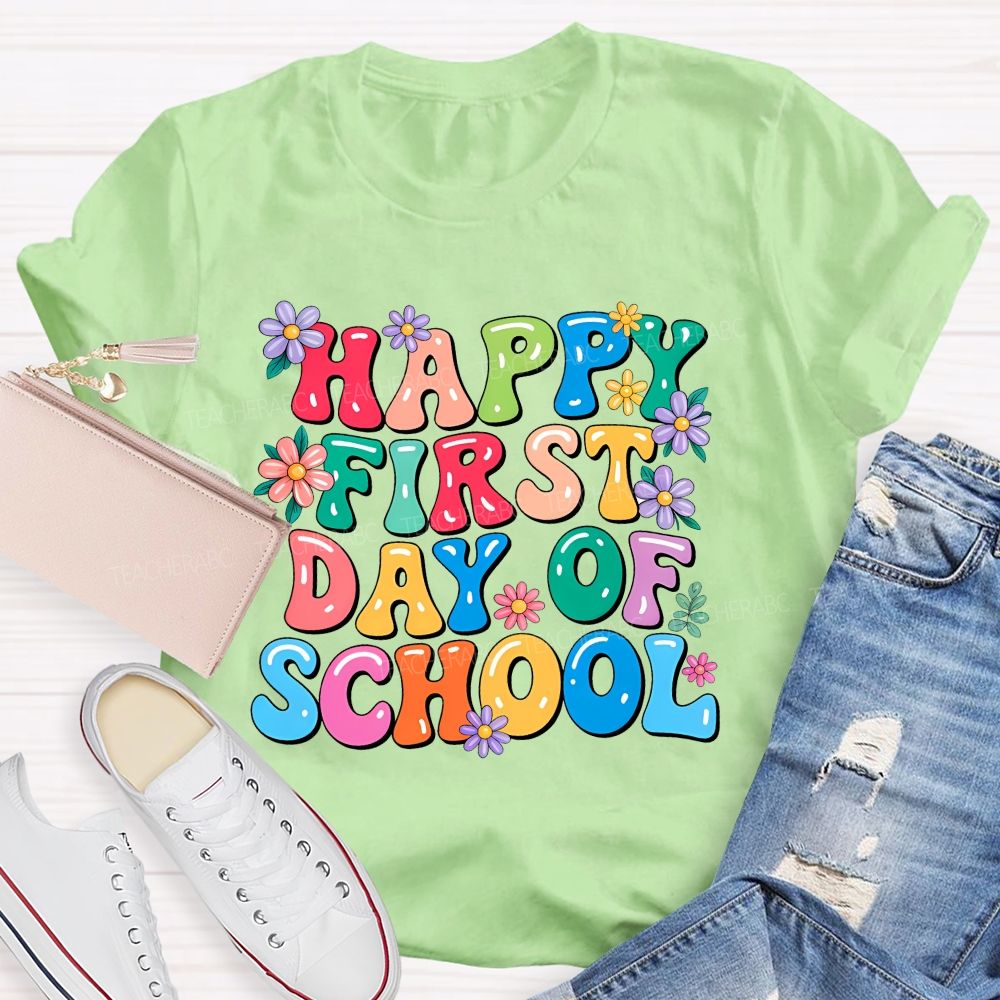 Happy First Day Of School  Flowers Letters  Teacher T-shirt