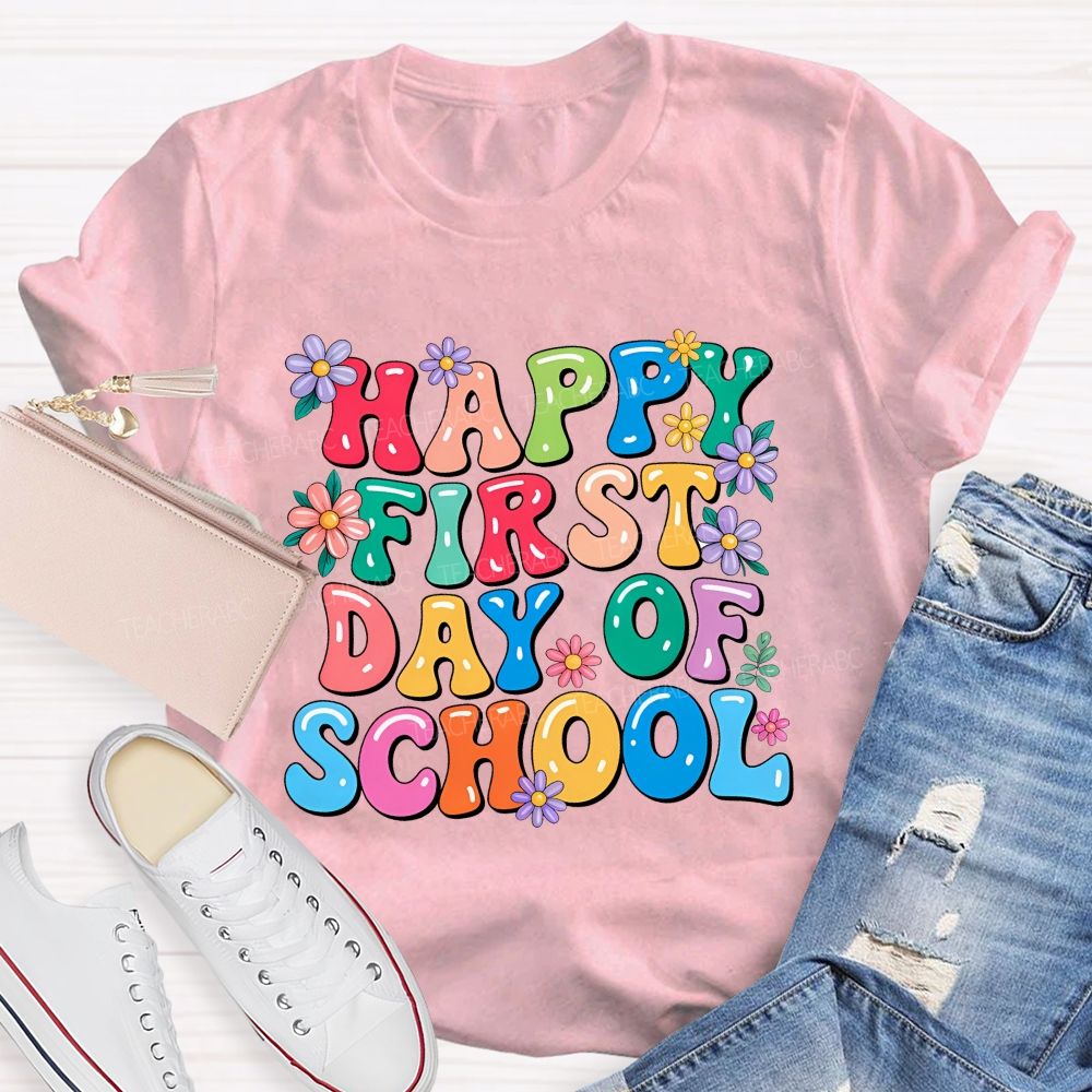Happy First Day Of School  Flowers Letters  Teacher T-shirt