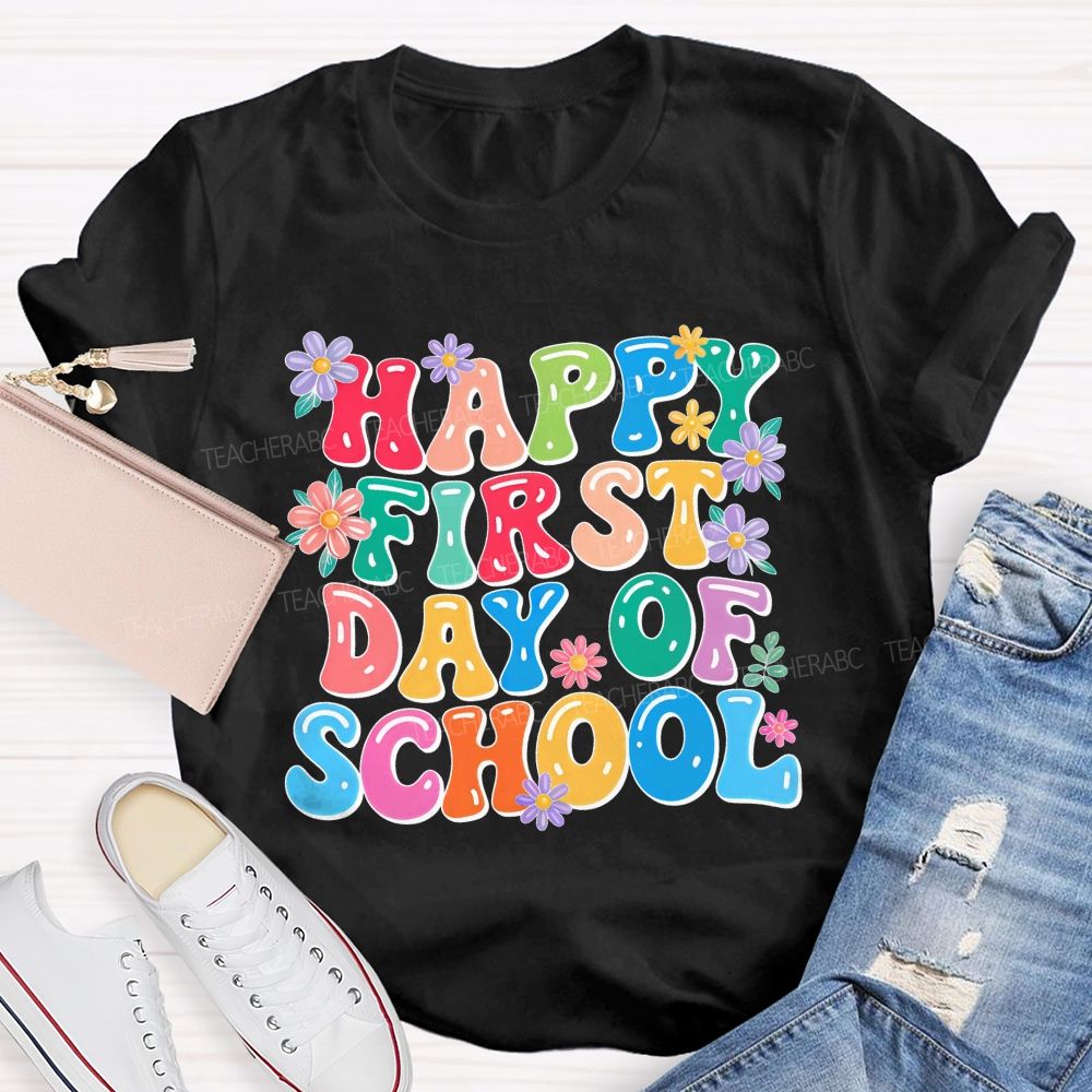 Happy First Day Of School  Flowers Letters  Teacher T-shirt