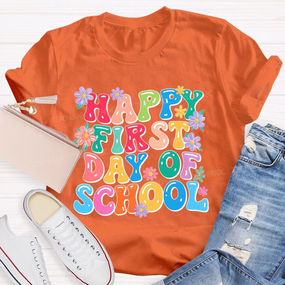Happy First Day Of School  Flowers Letters  Teacher T-shirt