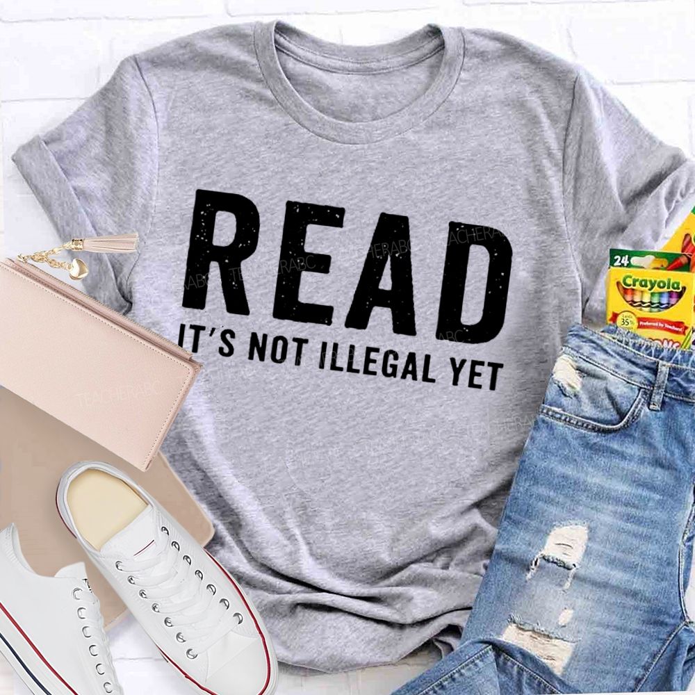 Read It's Not Illegal Yet   Teacher T-shirt