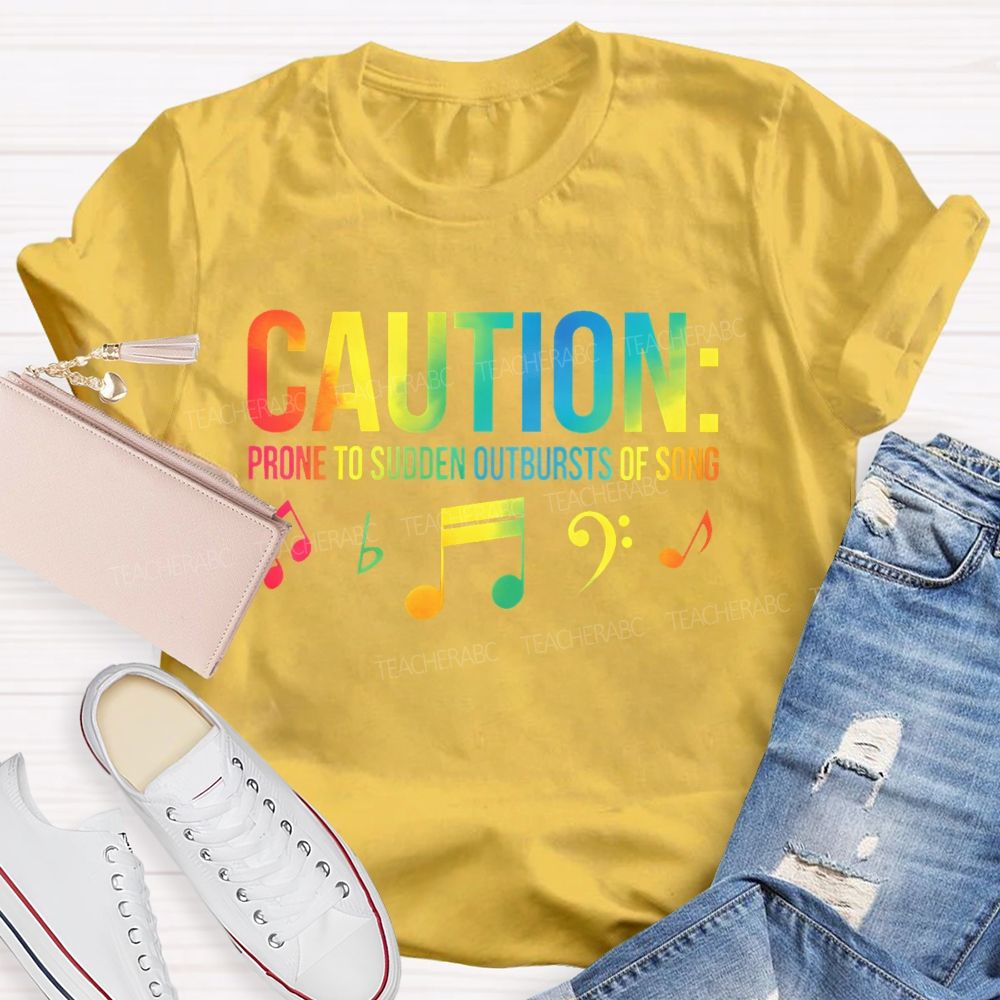 Caution Prone To Sudden Outbursts Of Song Colorful Letters  Teacher T-shirt
