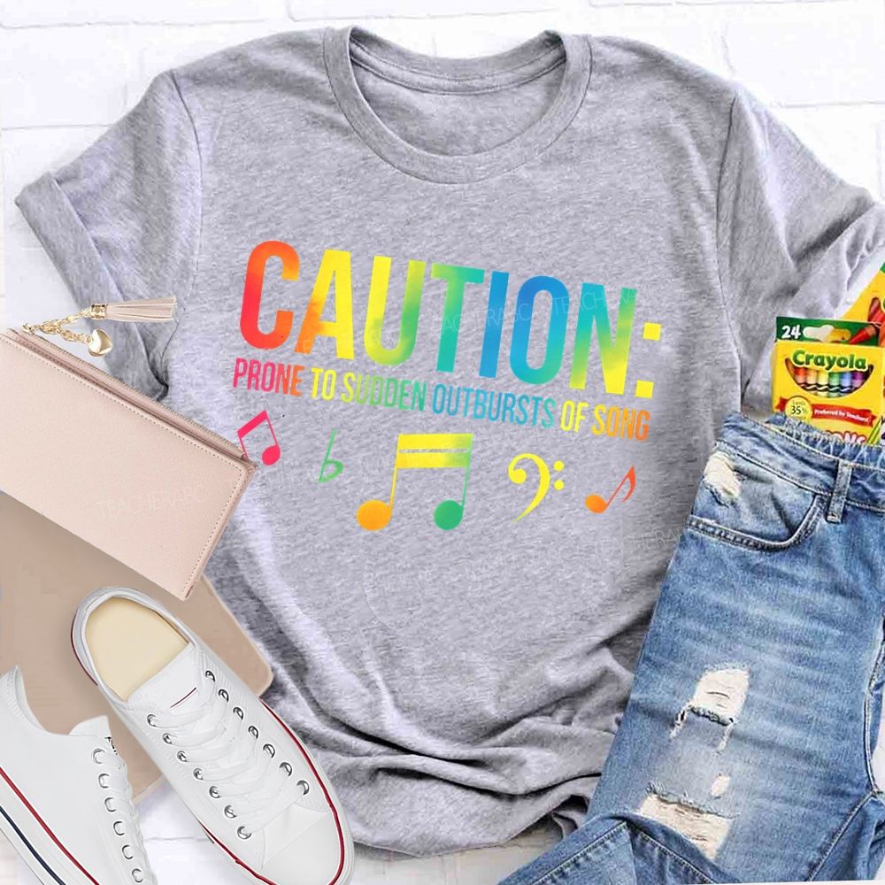 Caution Prone To Sudden Outbursts Of Song Colorful Letters  Teacher T-shirt