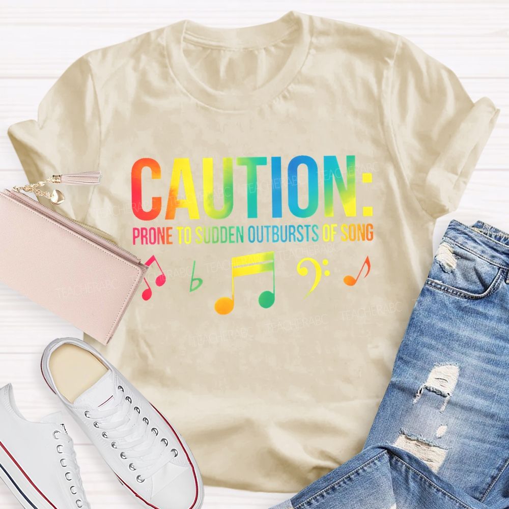 Caution Prone To Sudden Outbursts Of Song Colorful Letters  Teacher T-shirt