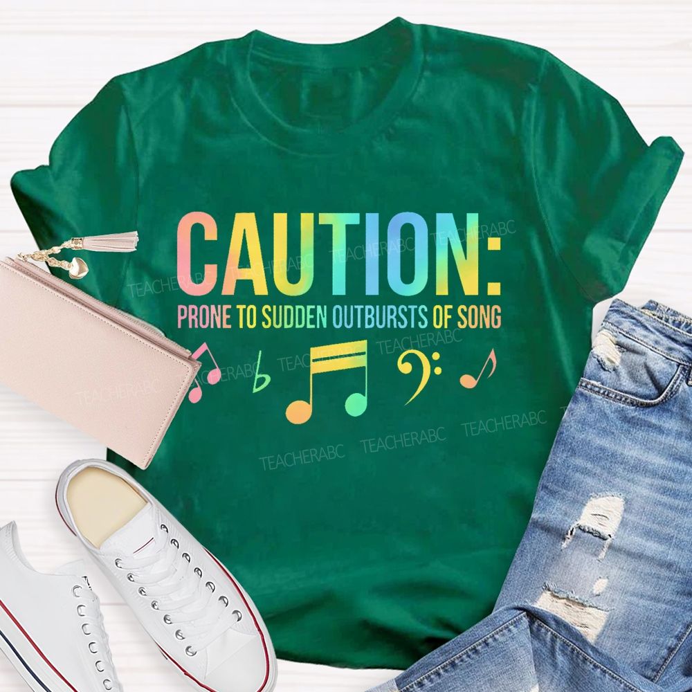 Caution Prone To Sudden Outbursts Of Song Colorful Letters  Teacher T-shirt