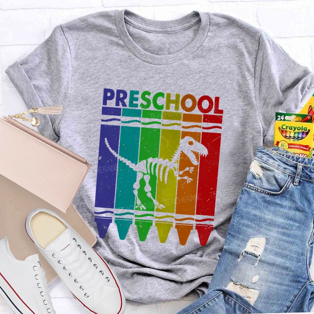 Personalized Grade Rainbow Crayon Dinosaur Skeleton Preschool Teacher T-shirt