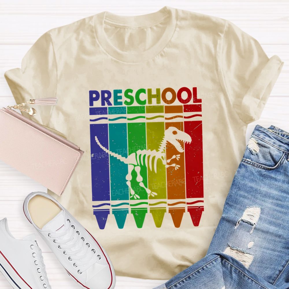 Personalized Grade Rainbow Crayon Dinosaur Skeleton Preschool Teacher T-shirt