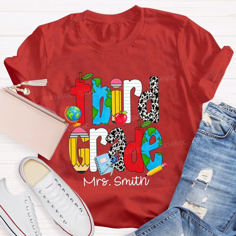 Personalized Name And Grade Cow Print And School‑Supply Doodle Teacher T-shirt