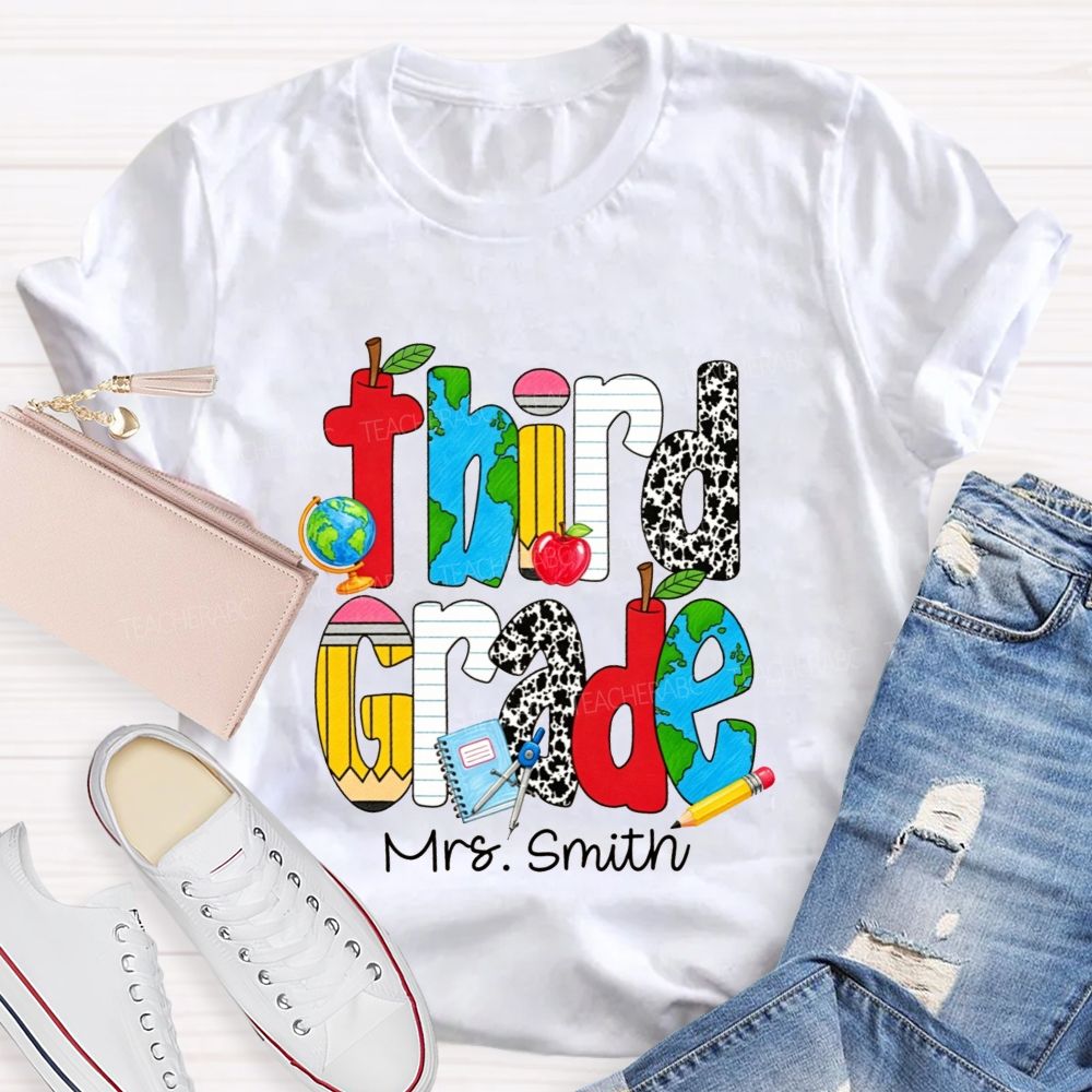 Personalized Name And Grade Cow Print And School‑Supply Doodle Teacher T-shirt