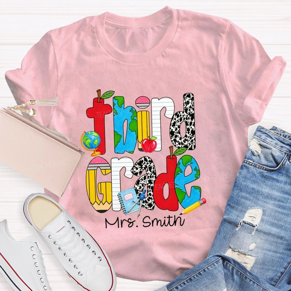 Personalized Name And Grade Cow Print And School‑Supply Doodle Teacher T-shirt