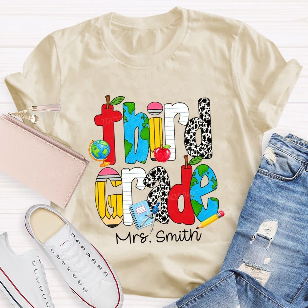 Personalized Name And Grade Cow Print And School‑Supply Doodle Teacher T-shirt