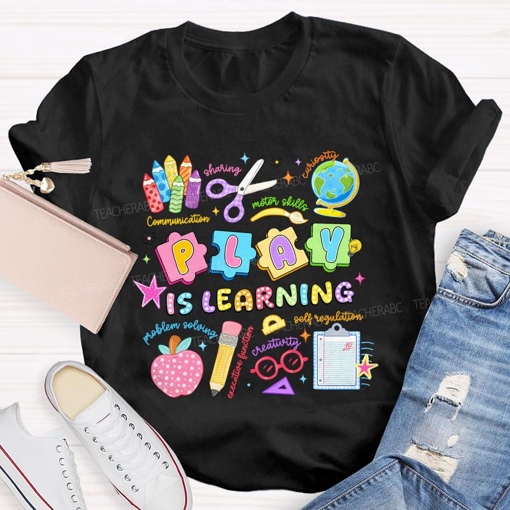 Play Is Learning Sharing Curiosity Motor Skills Communication Problem Solving Teacher T-shirt