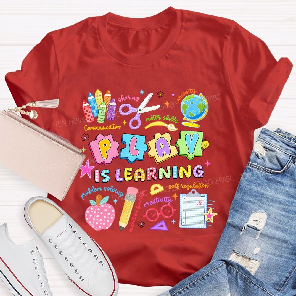 Play Is Learning Sharing Curiosity Motor Skills Communication Problem Solving Teacher T-shirt