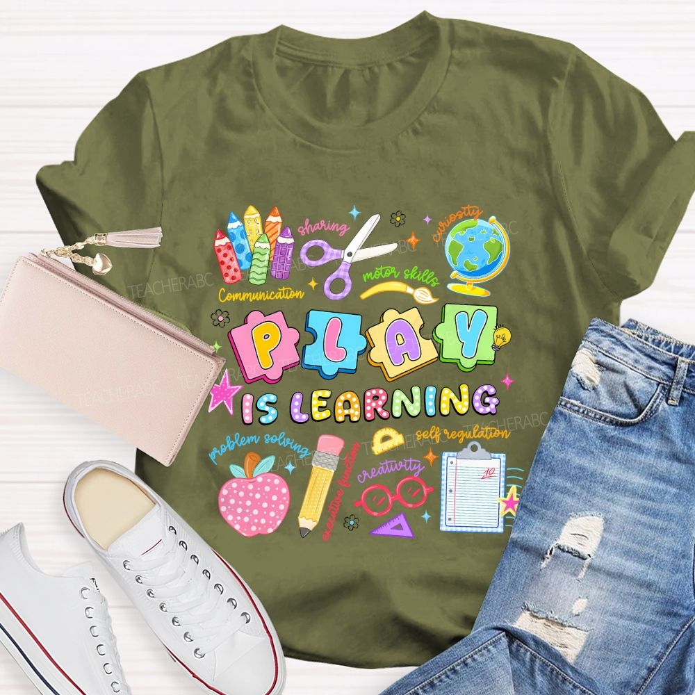 Play Is Learning Sharing Curiosity Motor Skills Communication Problem Solving Teacher T-shirt