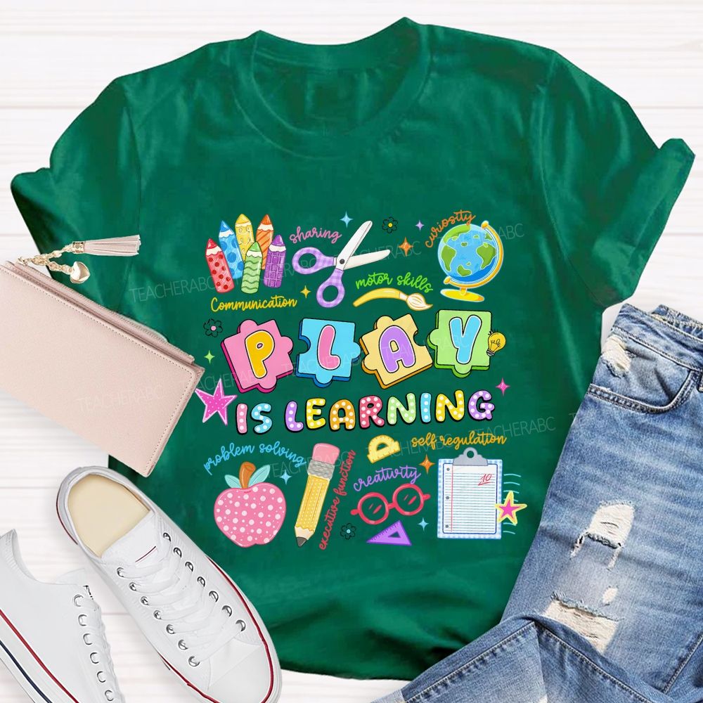 Play Is Learning Sharing Curiosity Motor Skills Communication Problem Solving Teacher T-shirt