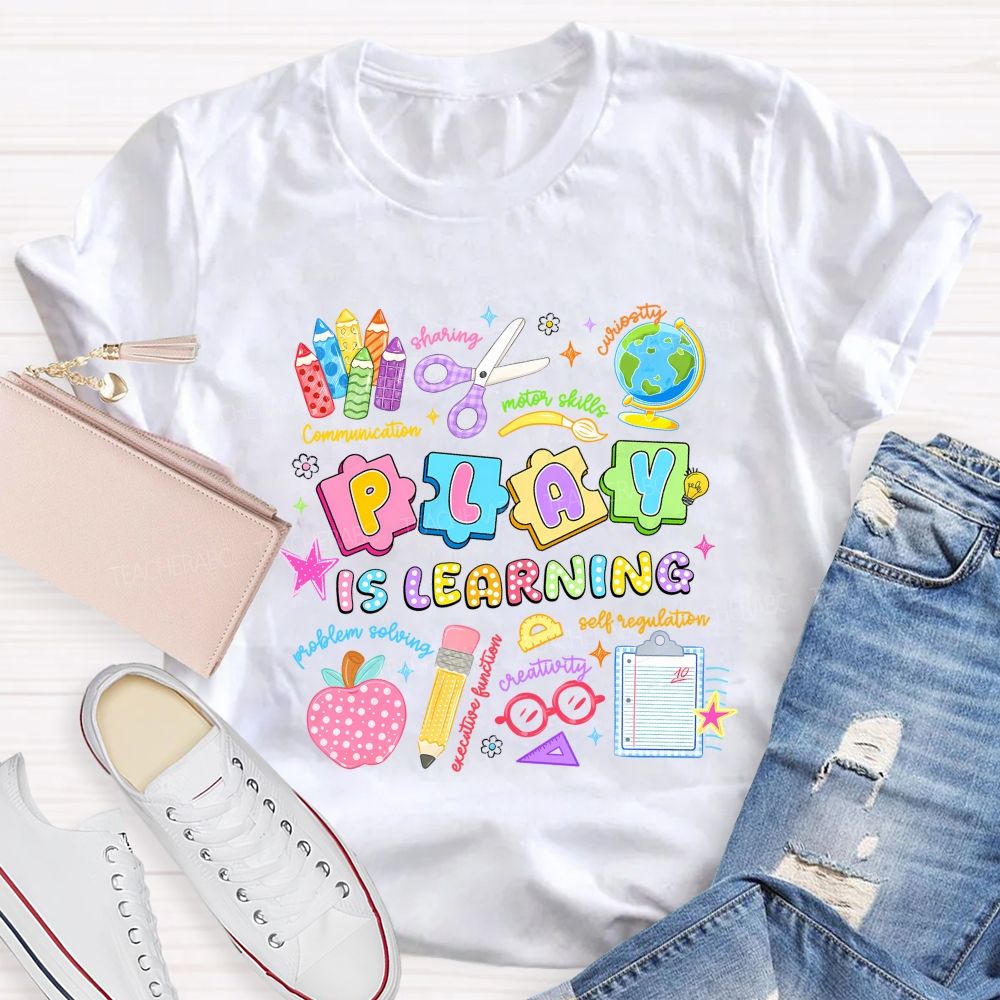 Play Is Learning Sharing Curiosity Motor Skills Communication Problem Solving Teacher T-shirt