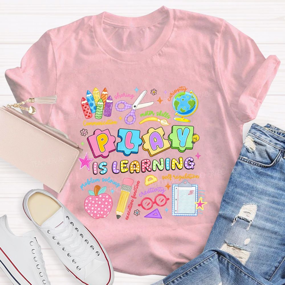 Play Is Learning Sharing Curiosity Motor Skills Communication Problem Solving Teacher T-shirt