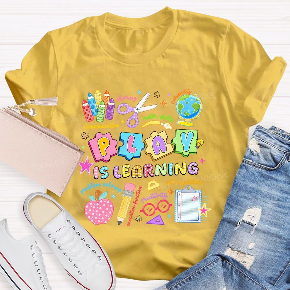 Play Is Learning Sharing Curiosity Motor Skills Communication Problem Solving Teacher T-shirt
