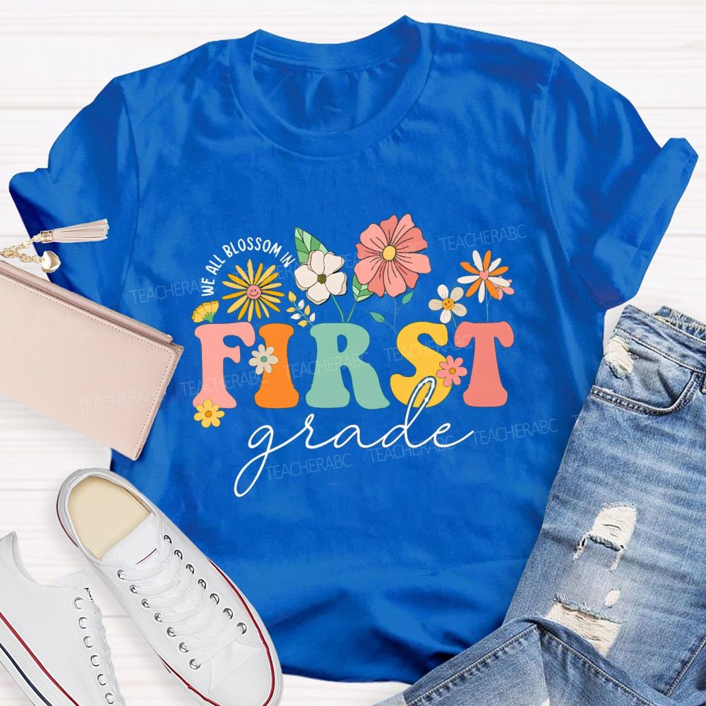 Personalized Grade We All Blossom In First Grade Floral Teacher T-Shirt
