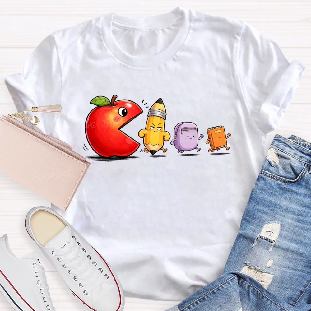 Funny Scene Of An Apple Chasing A Pencil And A Schoolbag.Back To School Teacher T-shirt