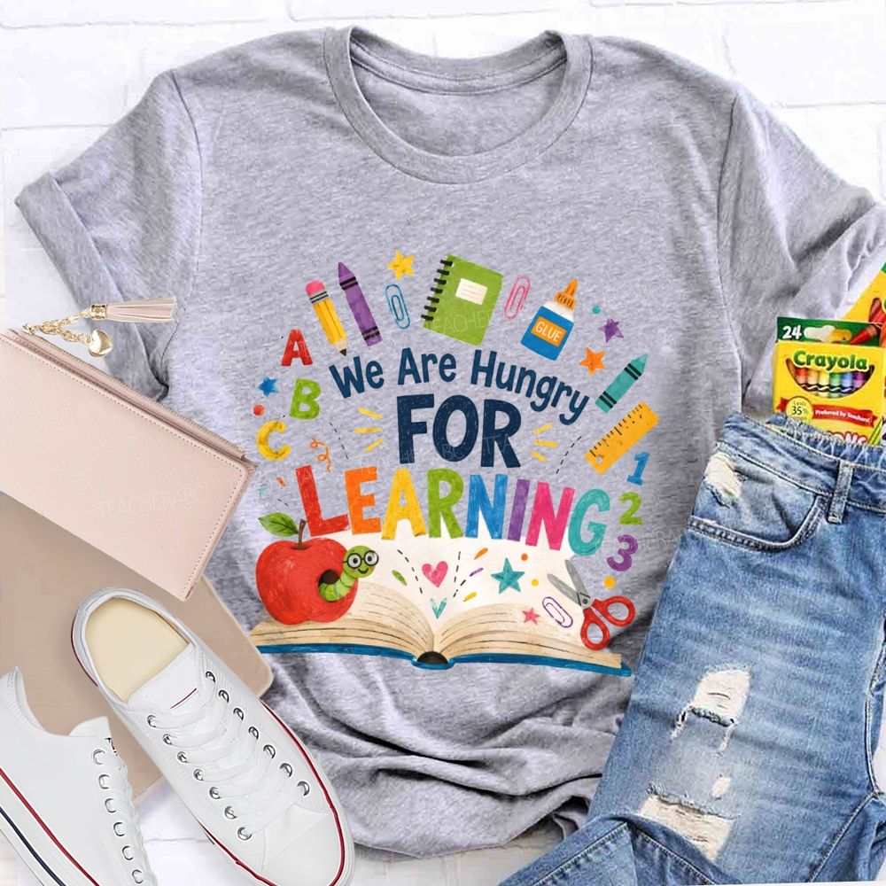 We Are Hungry For Learning The Caterpillar Eating The Apple Teacher T-Shirt