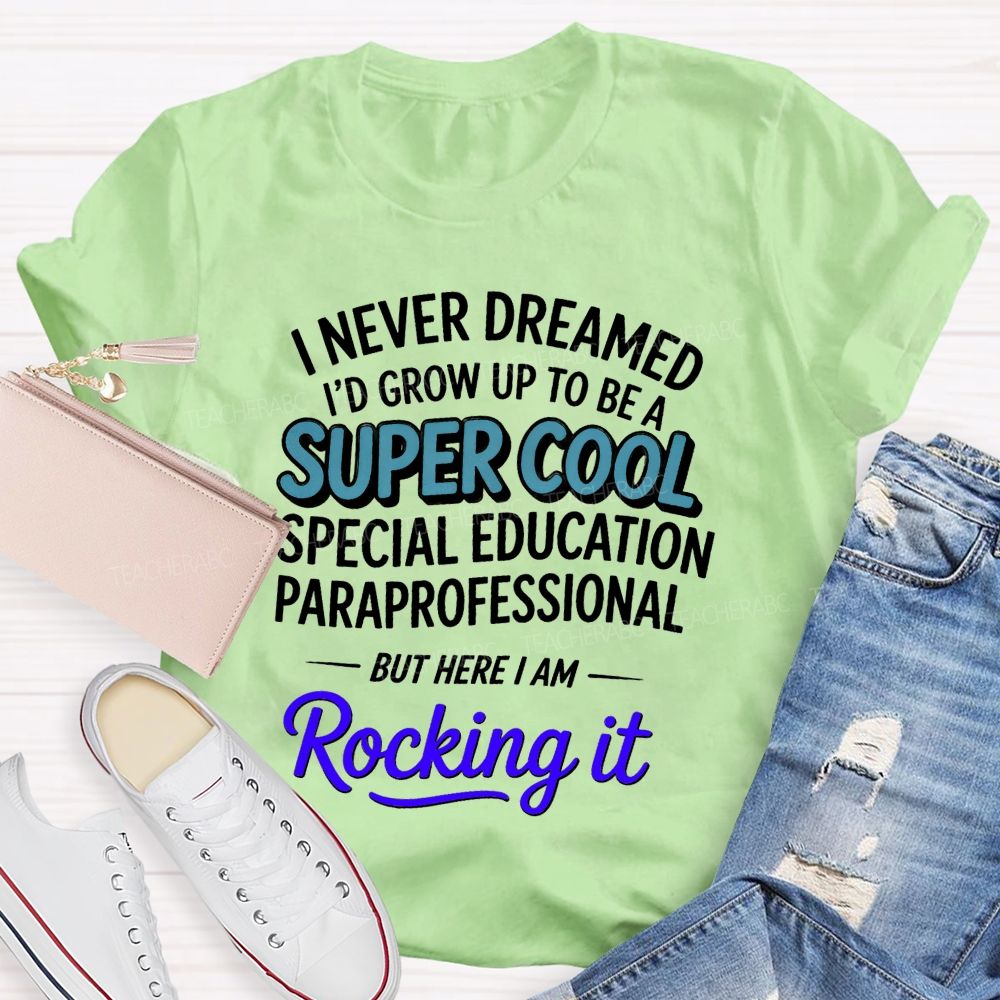 i never dreamed i'd grow up to be a super cool special education paraprofessional but here i am rocking it Teacher T-shirt