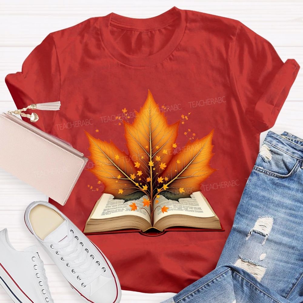 Books And Autumn Leaves Reading Brings Autumn Teacher T-shirt