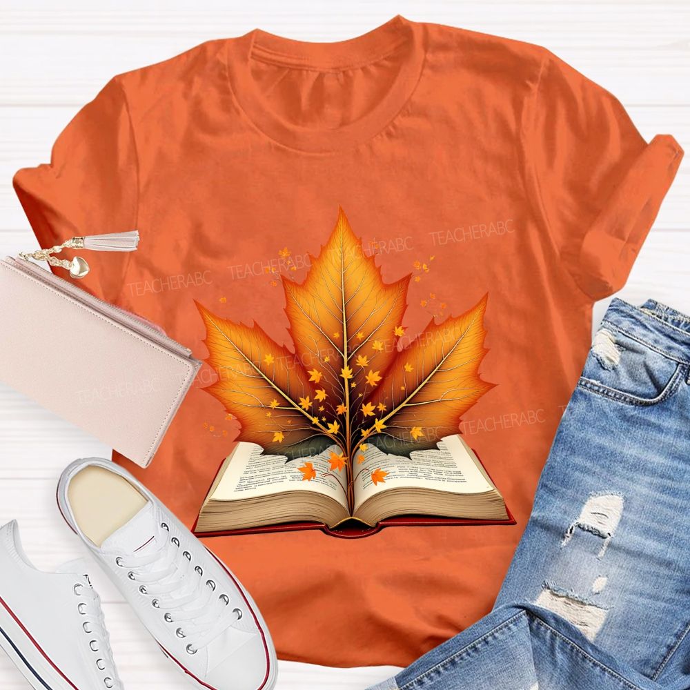 Books And Autumn Leaves Reading Brings Autumn Teacher T-shirt