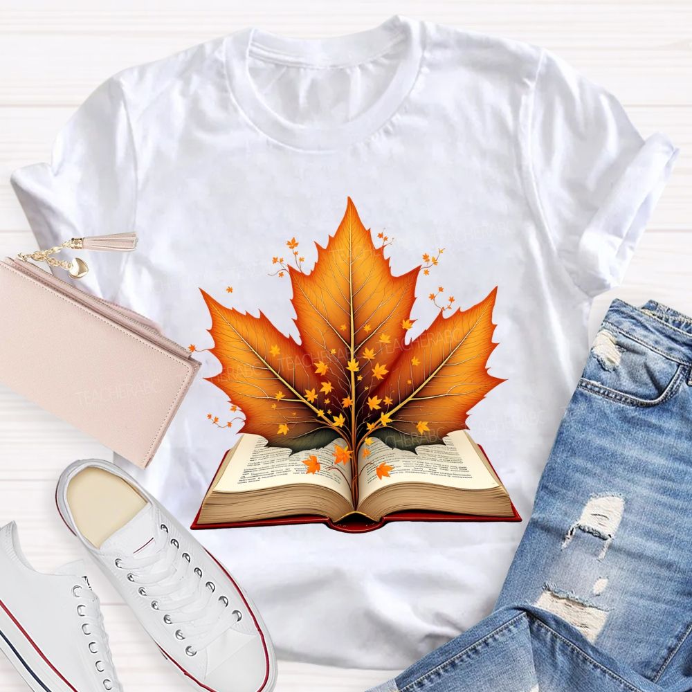 Books And Autumn Leaves Reading Brings Autumn Teacher T-shirt