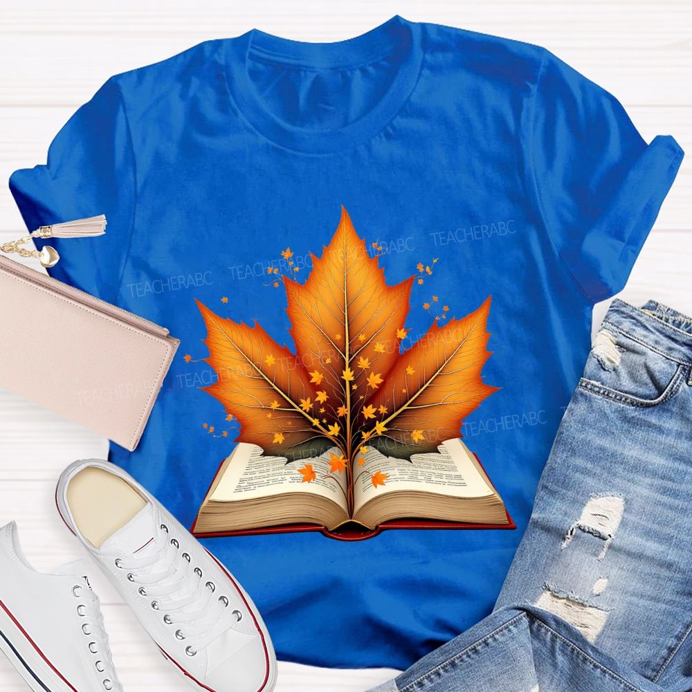 Books And Autumn Leaves Reading Brings Autumn Teacher T-shirt