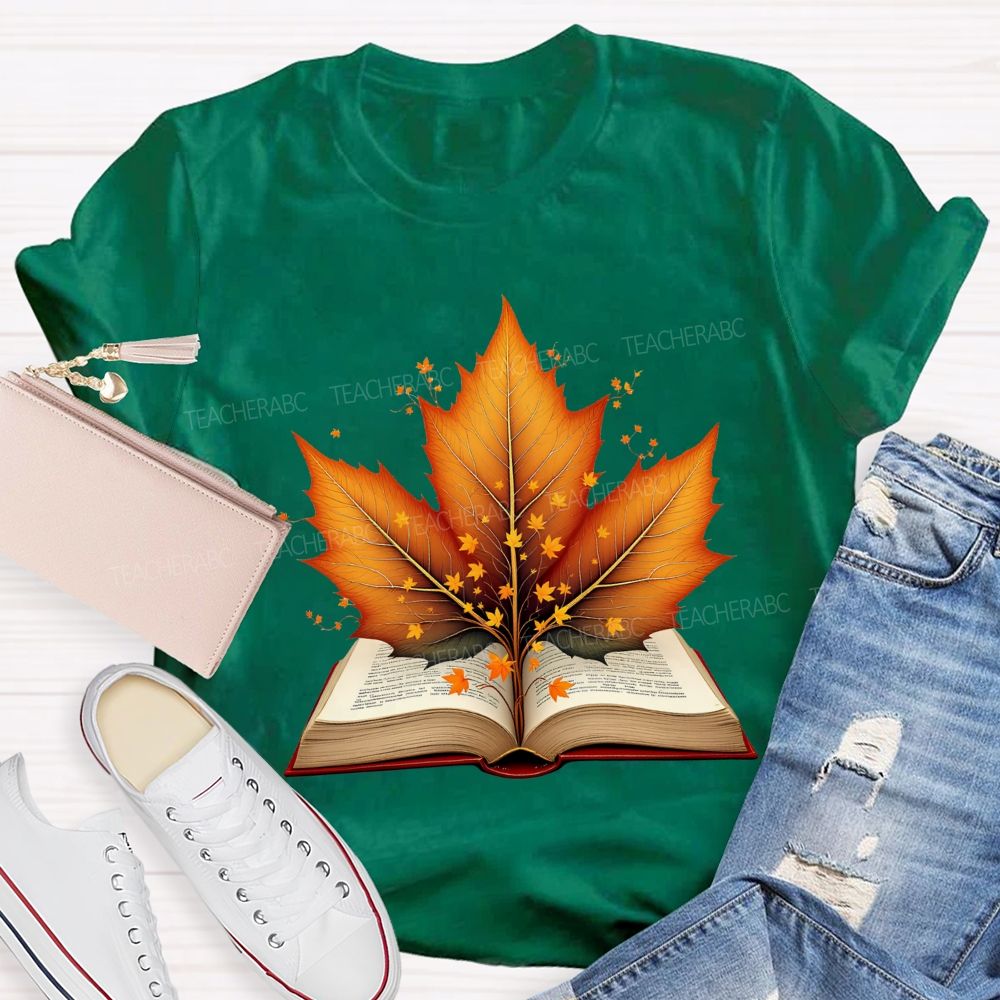 Books And Autumn Leaves Reading Brings Autumn Teacher T-shirt