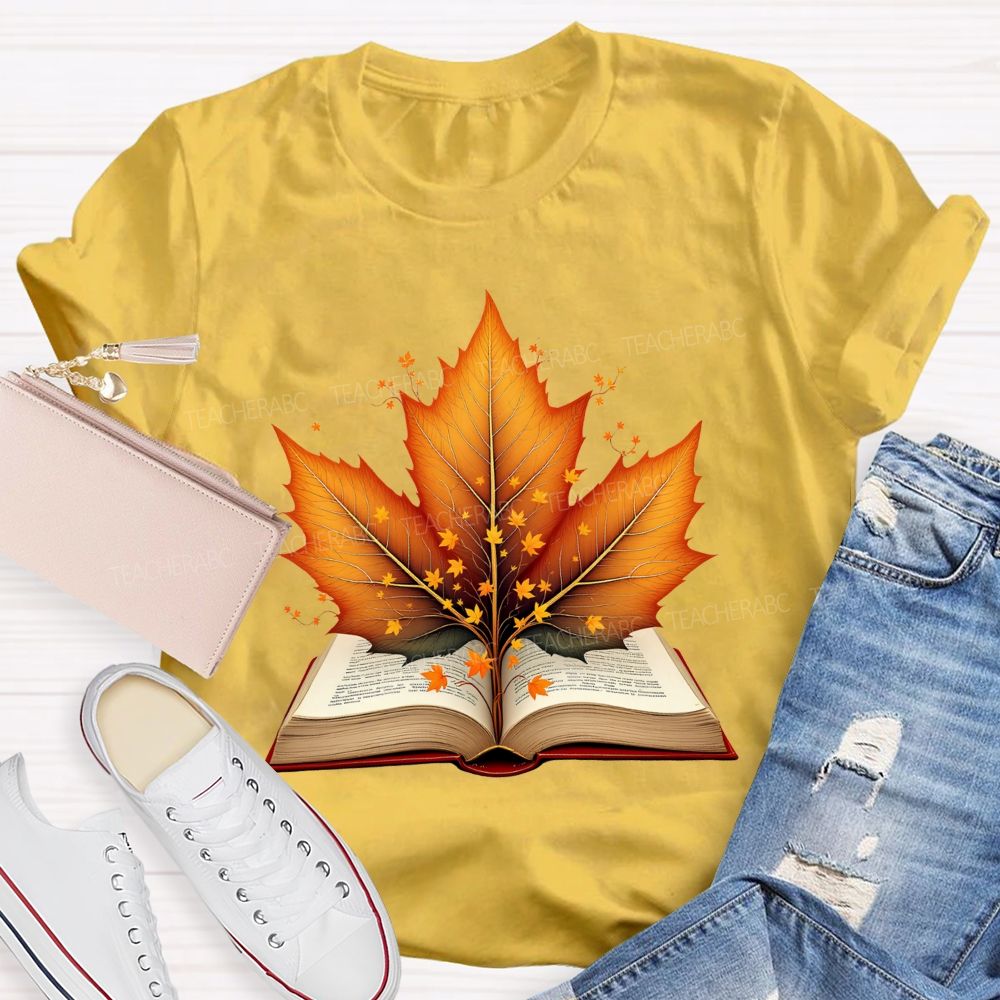 Books And Autumn Leaves Reading Brings Autumn Teacher T-shirt
