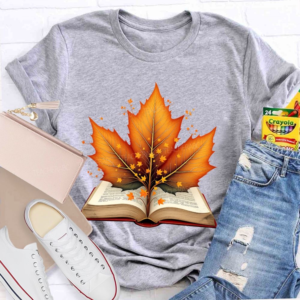 Books And Autumn Leaves Reading Brings Autumn Teacher T-shirt