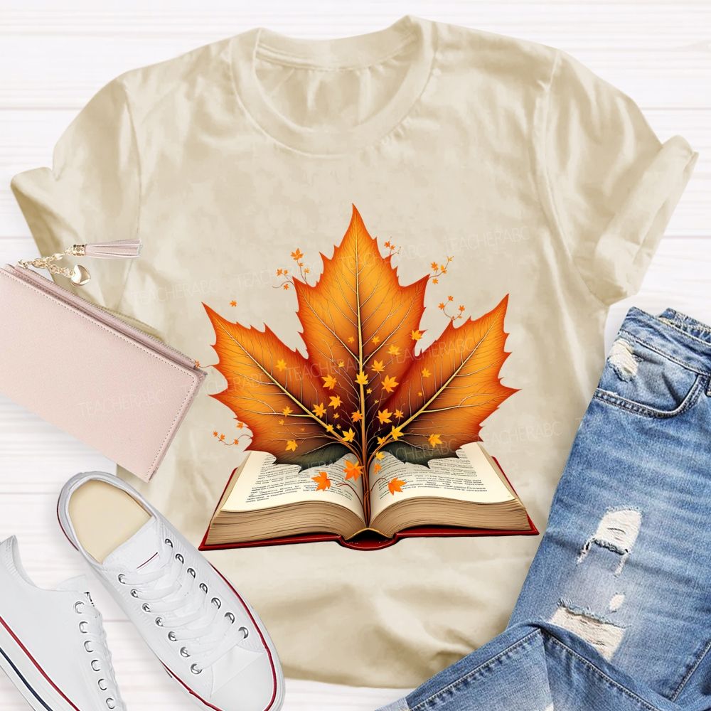 Books And Autumn Leaves Reading Brings Autumn Teacher T-shirt