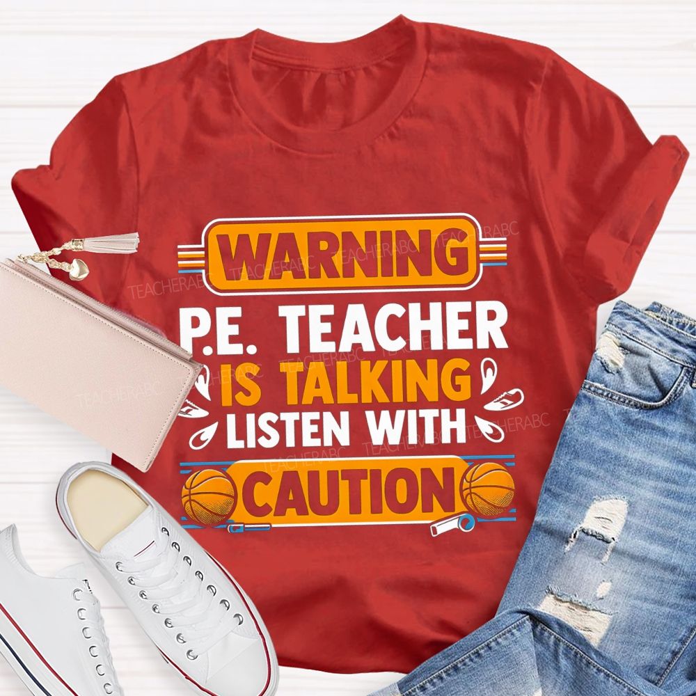Warning P.E. Teacher Is Talking Listen With Caution Teacher T-shirt