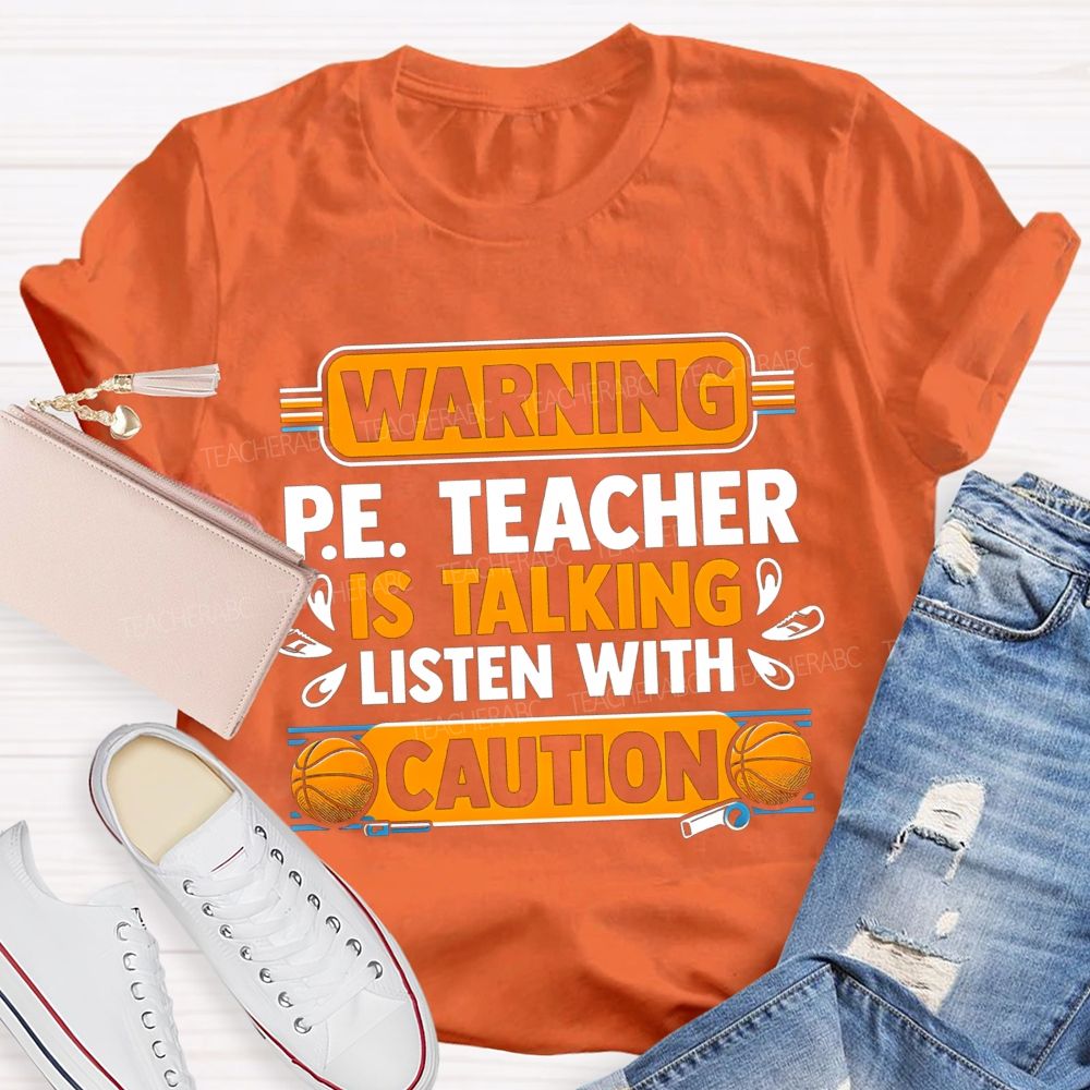 Warning P.E. Teacher Is Talking Listen With Caution Teacher T-shirt