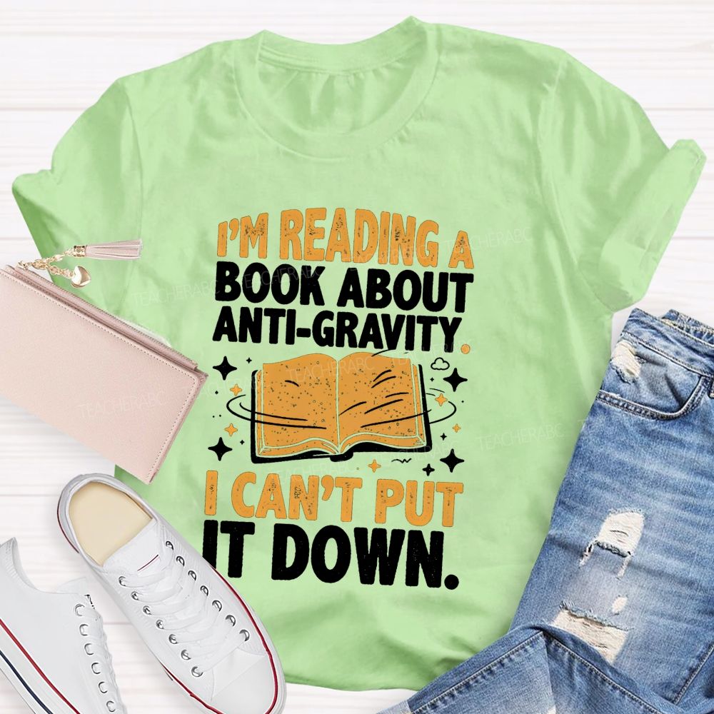 I'M Reading A Book About Anti‑Gravity I Can'T Put It Down Teacher T-shirt